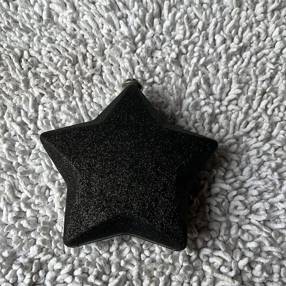 Star shaped sparkly hard sided evening bag